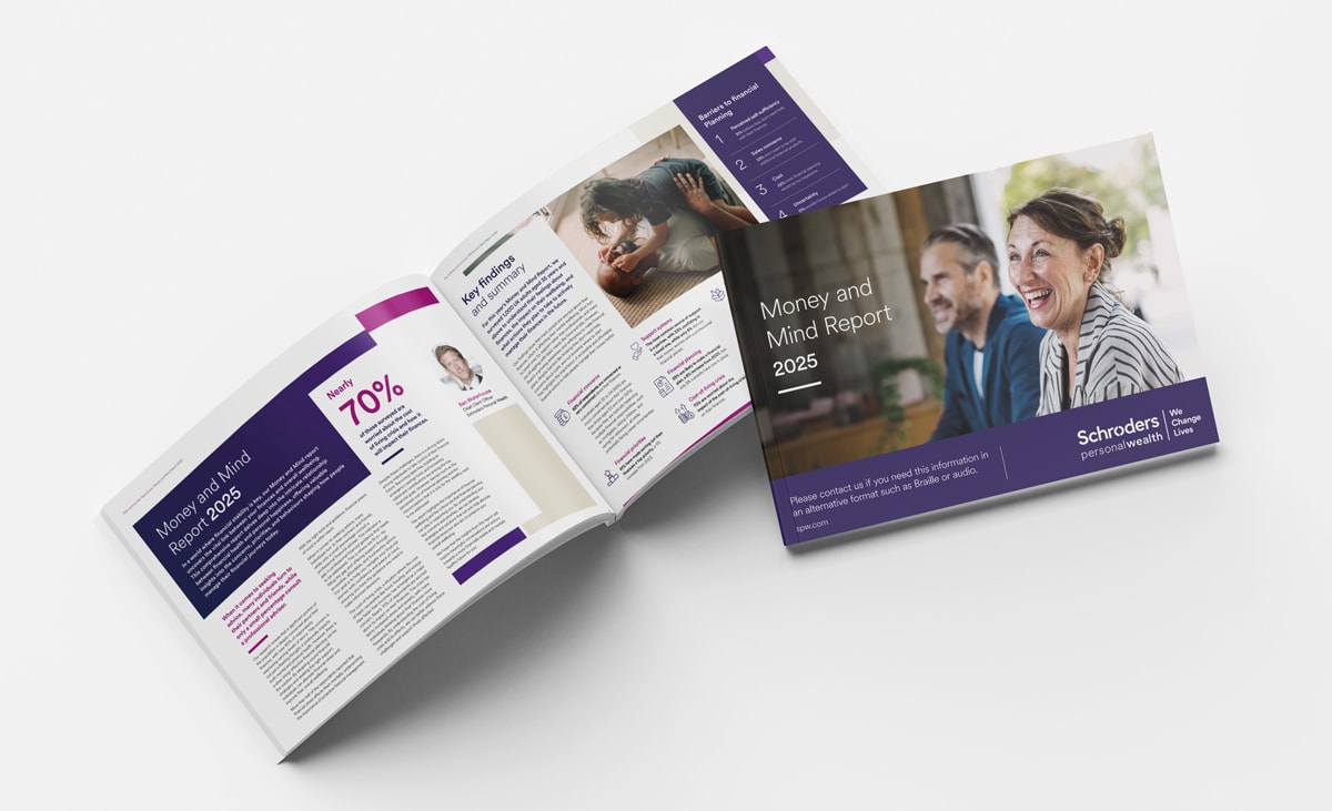 Person sitting on floor working on laptop